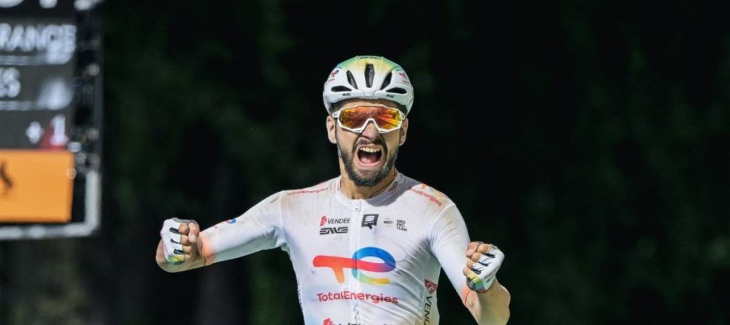 Antoine Turgis of Total Energies wins stage 9 of the 2024 Tour de France on gravel in Troyes wearing a HJC helmet