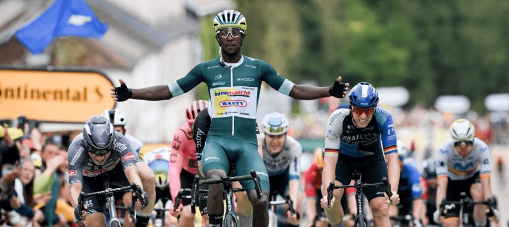 Biniam Girmay of Intermarche Wanty team wins stage 8 of the 2024 Tour de France from Semmy en Auxois to COLOMBEY LES DEUX ÉGLISES wearing a Uvex helmet