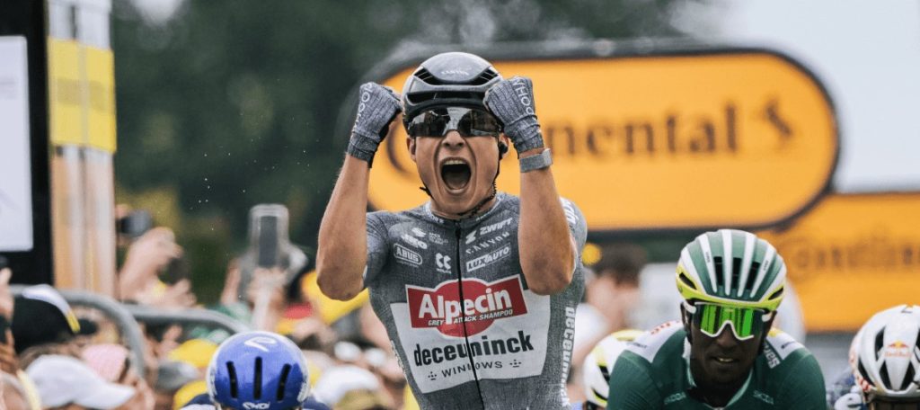 Jasper Philippsen of Alpecin Deceuninck wins the sprint to Saint Amand Montrond on stage 10 of the 2024 Tour de France wearing Gamechanger 2.0 helmet